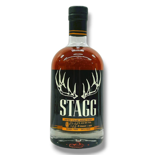 Bottle of Stagg 25b 126.9 proof whiskey with a black label featuring deer antlers on a white background